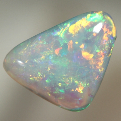 SOLID CRYSTAL OPAL Sparkles of orange and green in a 3D pattern 